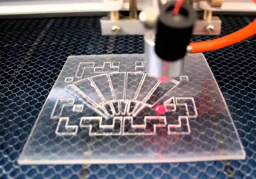 Acrylic laser cutting on display for logo and desing